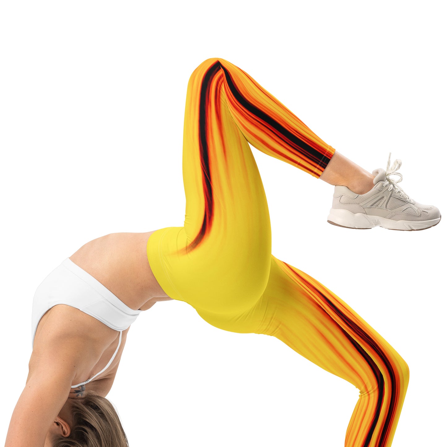 Eine Frau trägt die Moving Forest One Yellow Red Mid Waist Damen Leggings von Bachblatt und macht ein Yoga Pose. Ansicht von der Seite.
